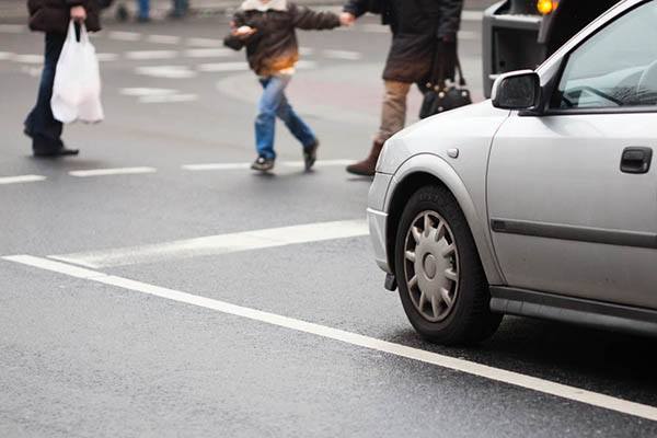 pedestrians crossing the street