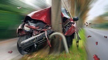 red car crashed into a pole