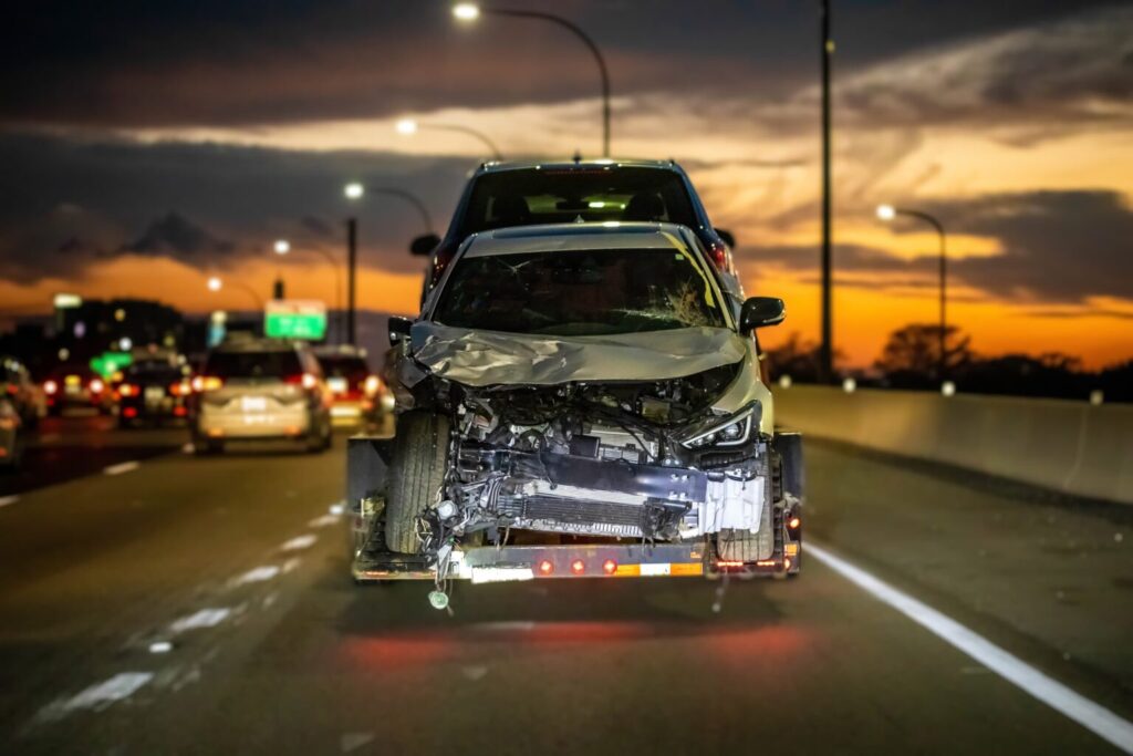 Wrecked-Car-being-towed-1536x1024