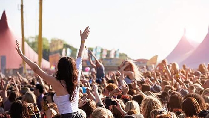 crowd of people at a music festival before a personal injury happens