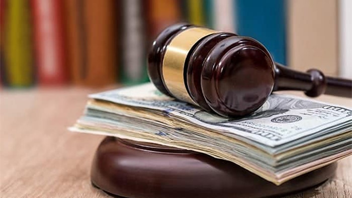 cash under a justice gavel