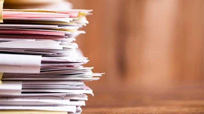 A stack of documents.