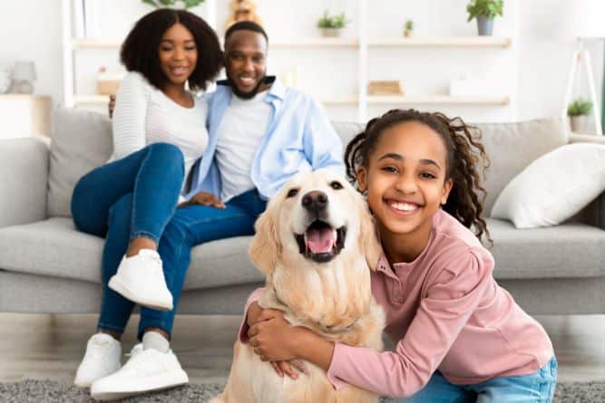 happy-family-with-a-golden-retriever