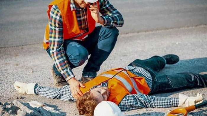 construction worker suffering from heat stroke