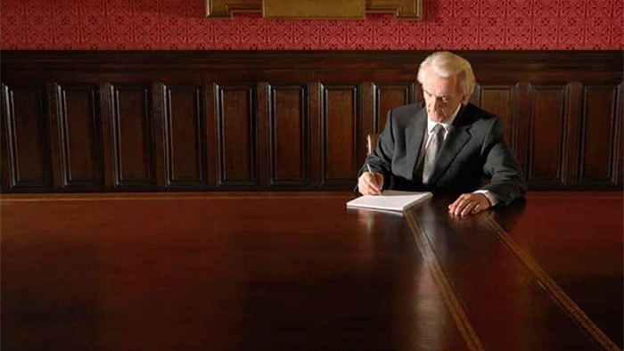 personal injury lawyer sitting at a table