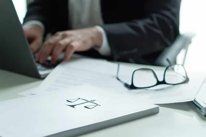 How A Lawyer Settles A Personal Injury Case 1 Personal-injury-attorney-working-on-case
