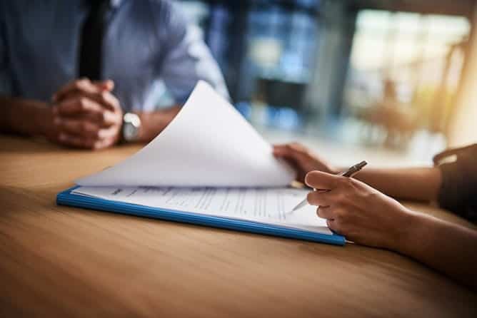 How A Lawyer Settles A Personal Injury Case 2 Reviewing settlement offer with personal injury attorney