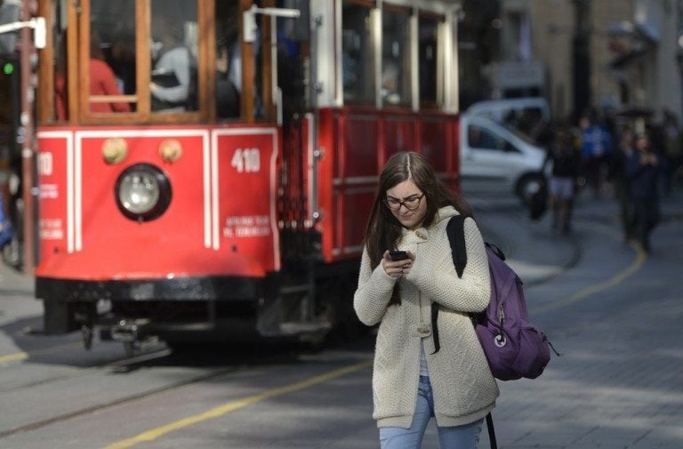 Dangers Of Texting While Walking 1 Woman-distracted-by-phone-768x505