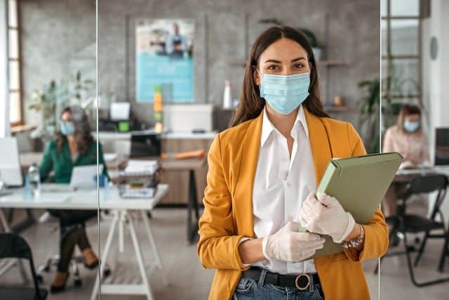 worker-safe-at-work-with-personal-protective-face-mask