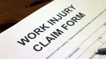 An up-close shot of a work injury claim form.