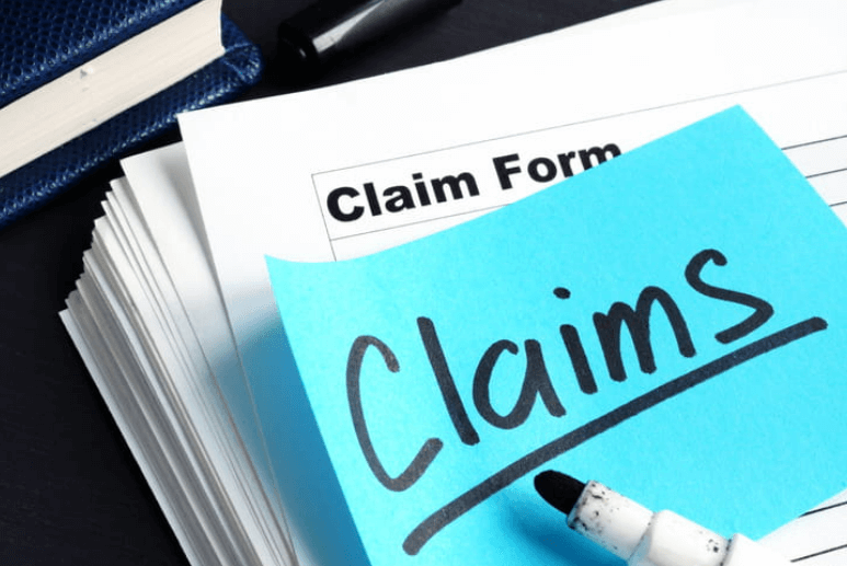 a-stack-of-claim-forms