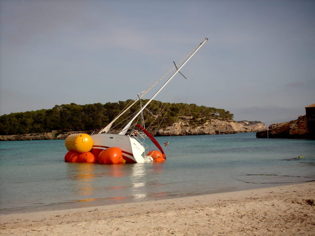 A sinking boat after a boating accident.