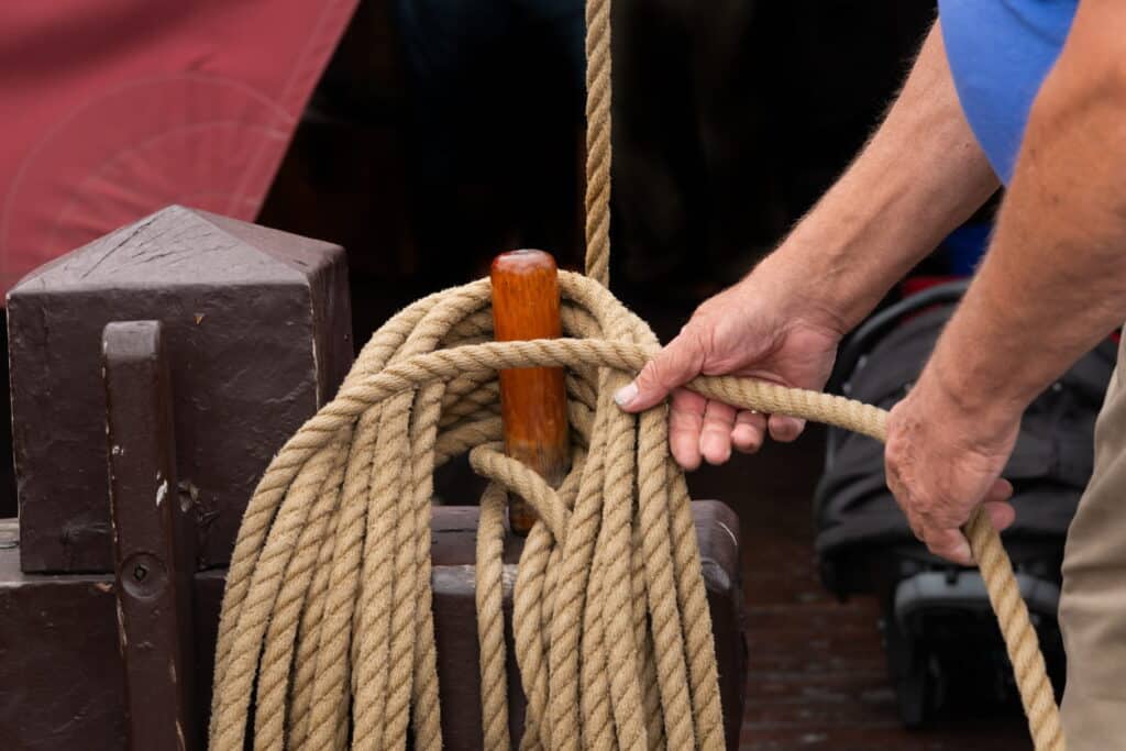 Man tying boat down after boat injury