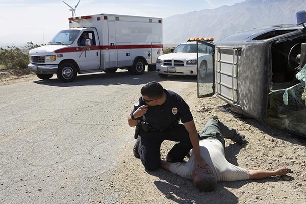 police-helping-injured-man