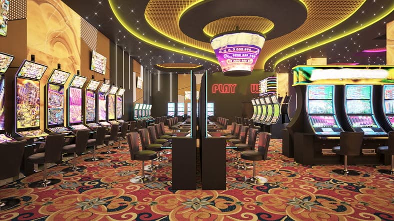 Rows of empty slot machines at a casino.