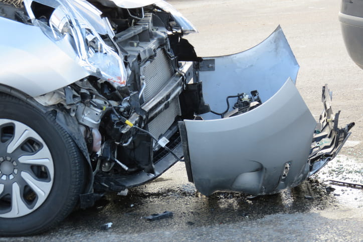 A severely damaged vehicle after a car accident.
