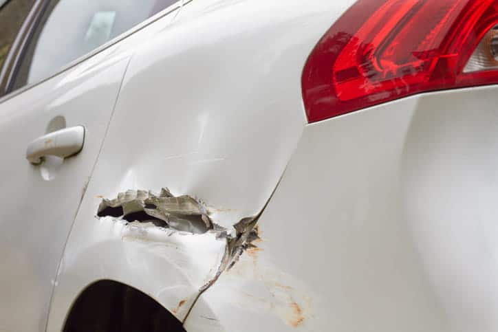 A damaged vehicle after a hit-and-run accident.