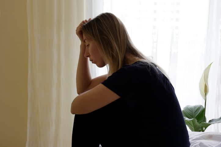 Can You Sue For Emotional Distress In Nevada? 1 A woman holding her head in distress.