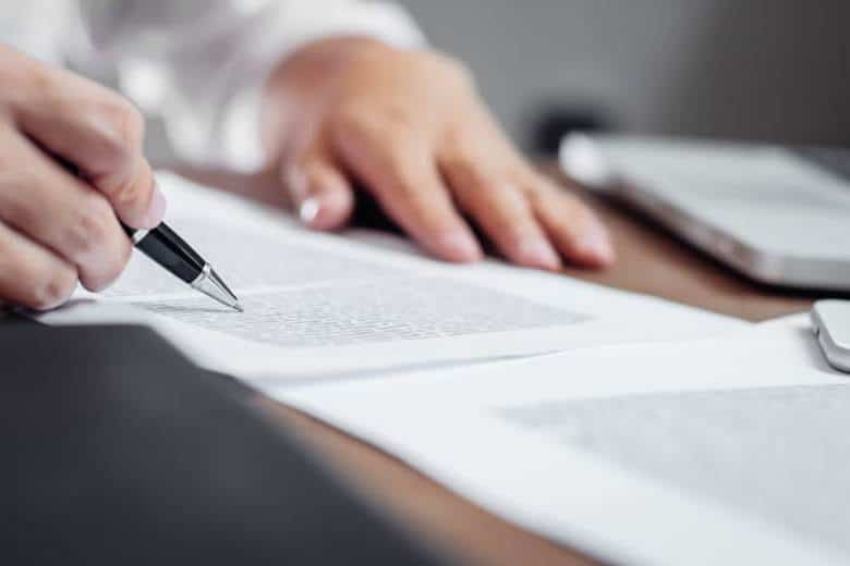 How Long Does It Take To Get A Settlement Check In Las Vegas? 21 A lawyer reviews a settlement offer from an insurance company.